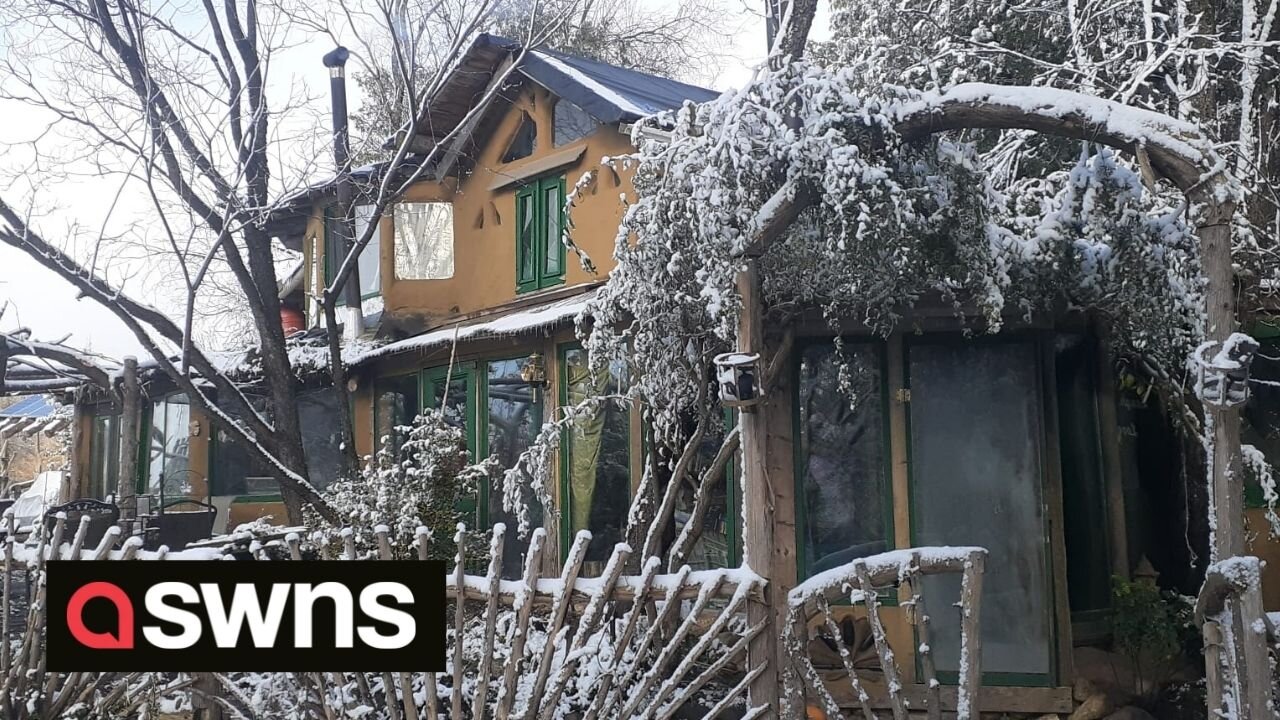 US family ditch big city to live in self-built 'clay' home