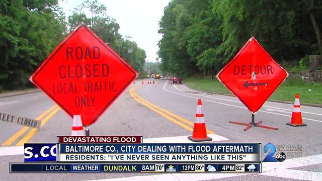 Residents start the rebuilding process after weekend flooding