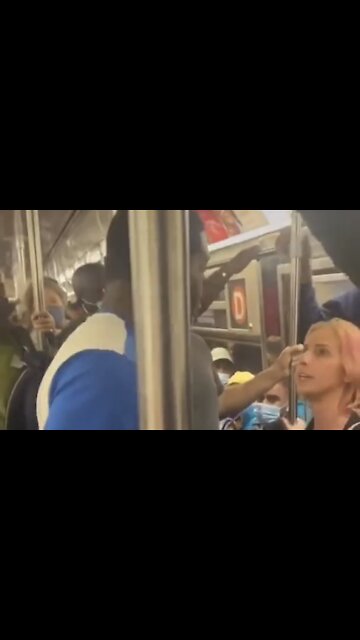 Black Man punches white woman on crowded NYC Subway for telling him to take Chill Pill