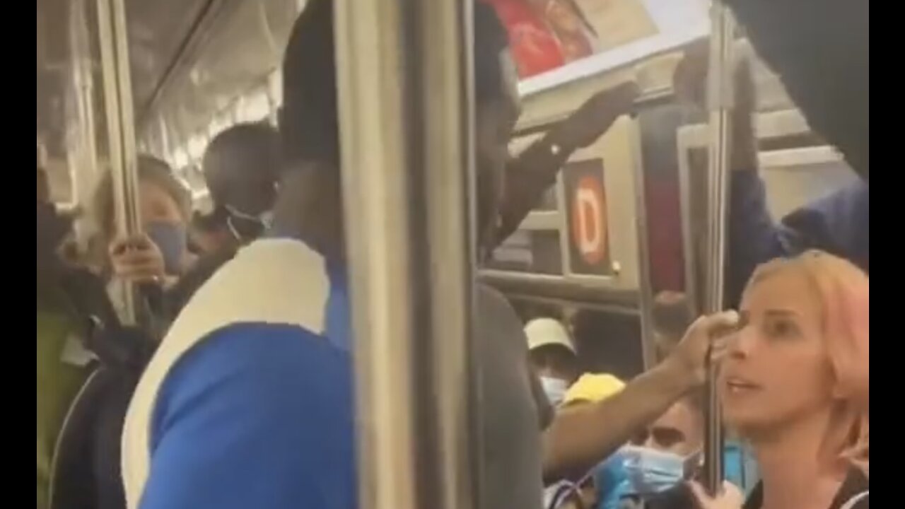 Black Man punches white woman on crowded NYC Subway for telling him to take Chill Pill