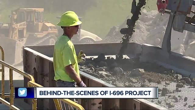 Crews rebuilding I-696 reusing the old concrete as part of the new roadway