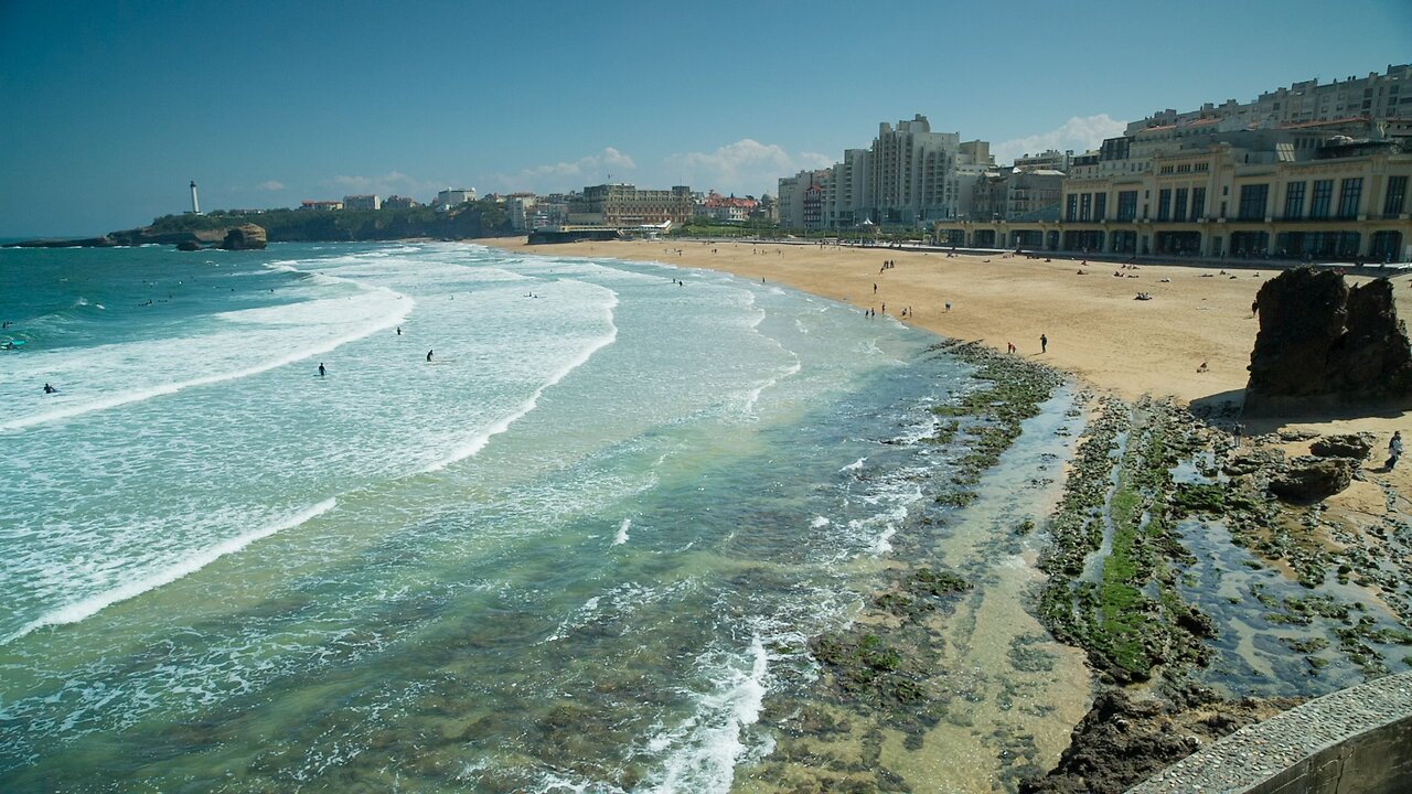 Ocean waves bursting on the shore of the coast