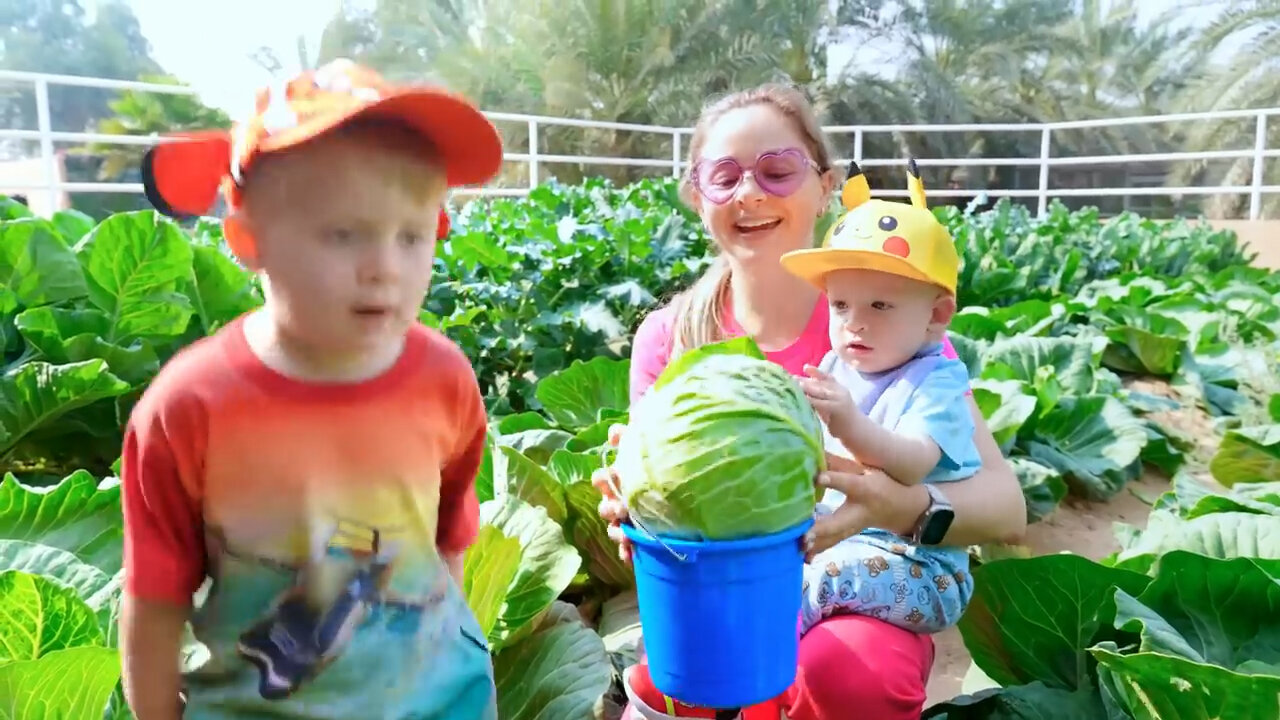 Oliver and Mom learn to harvest berries at the farm