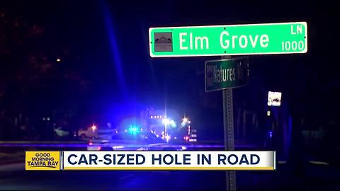 Broken water pipe creates hole in Valrico road