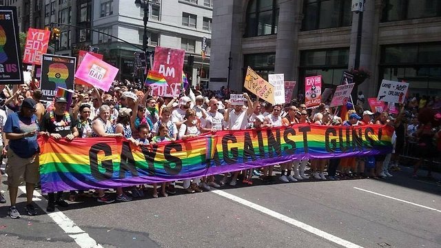 Rainbow Flag Takes On Additional Meaning For Gays Against Guns