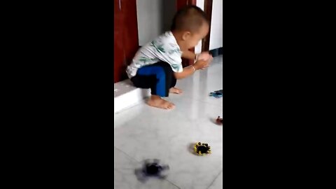 A happy little boy playing