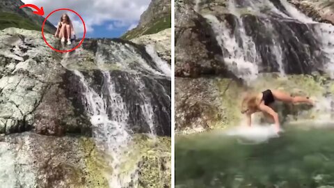 Girl sliding from scary hill fountain