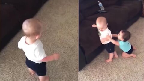 Baby screams when they get a "surprise" from their friend