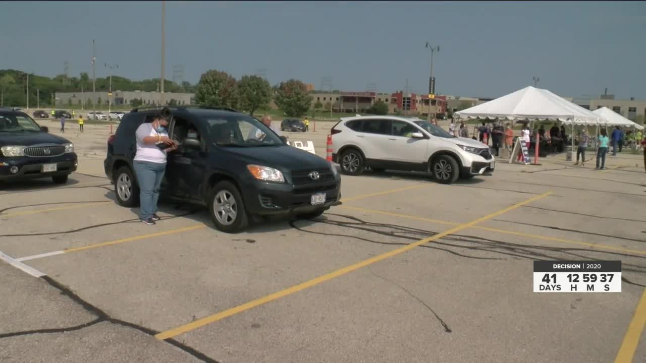 Dozens register to vote at Miller Park drive-thru event