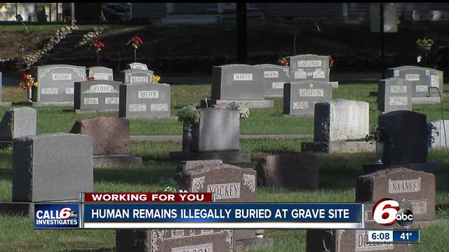 Human remains illegally buried at grave site in Owen County