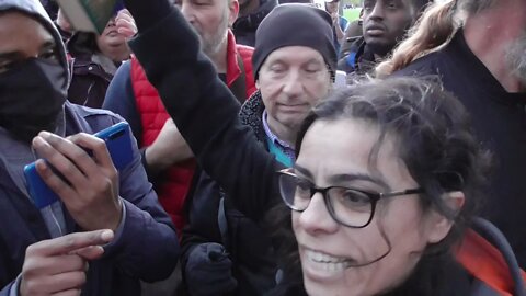 HATUN DRAGGED THROUGH THE CROWED HOLDING ON TO HER BOOK #speakerscorner