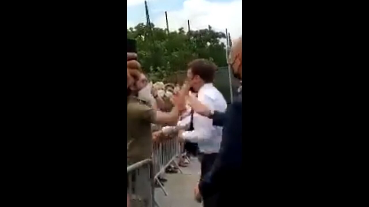French President Slapped in the Face When Speaking to Crowd