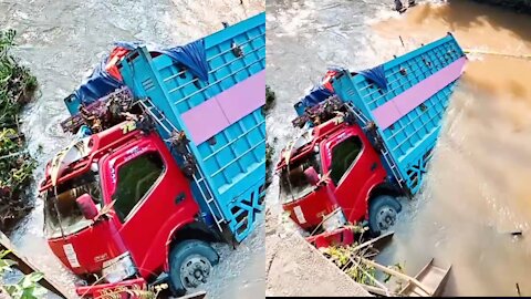 canter truck rolled into the river