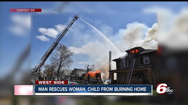 Man rescued pregnant woman, child from burning Indianpaolis home