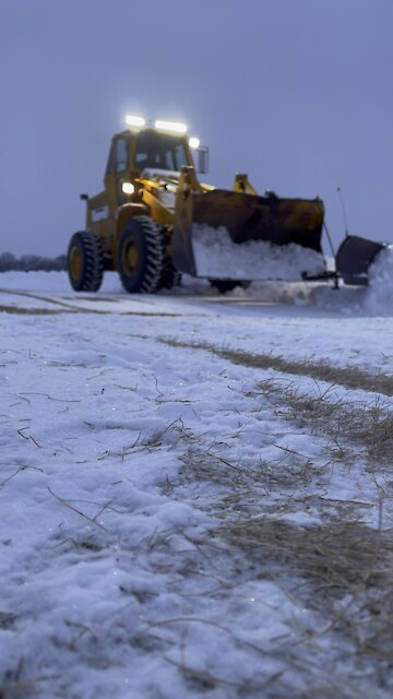 Plowing snow with a front end loader