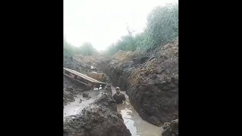 A flooded trench in Ukraine