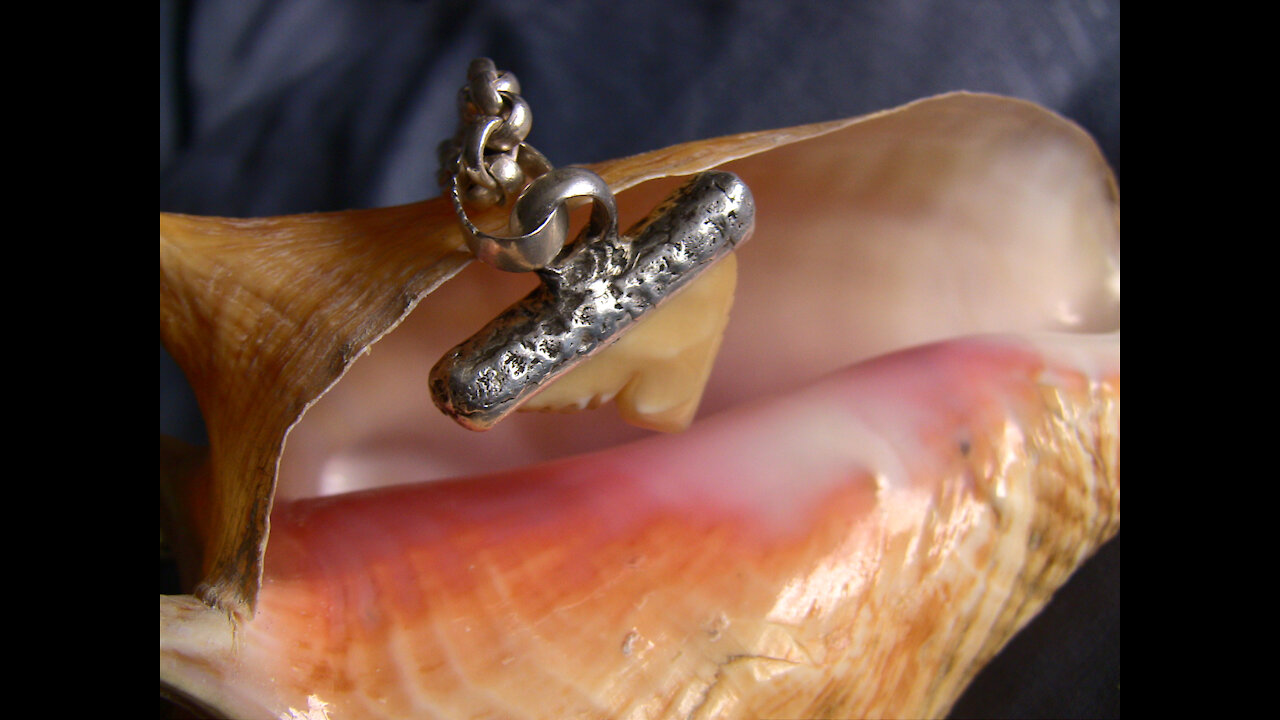 Nautical style fine silver rolo chain, with carved shark tooth pendant