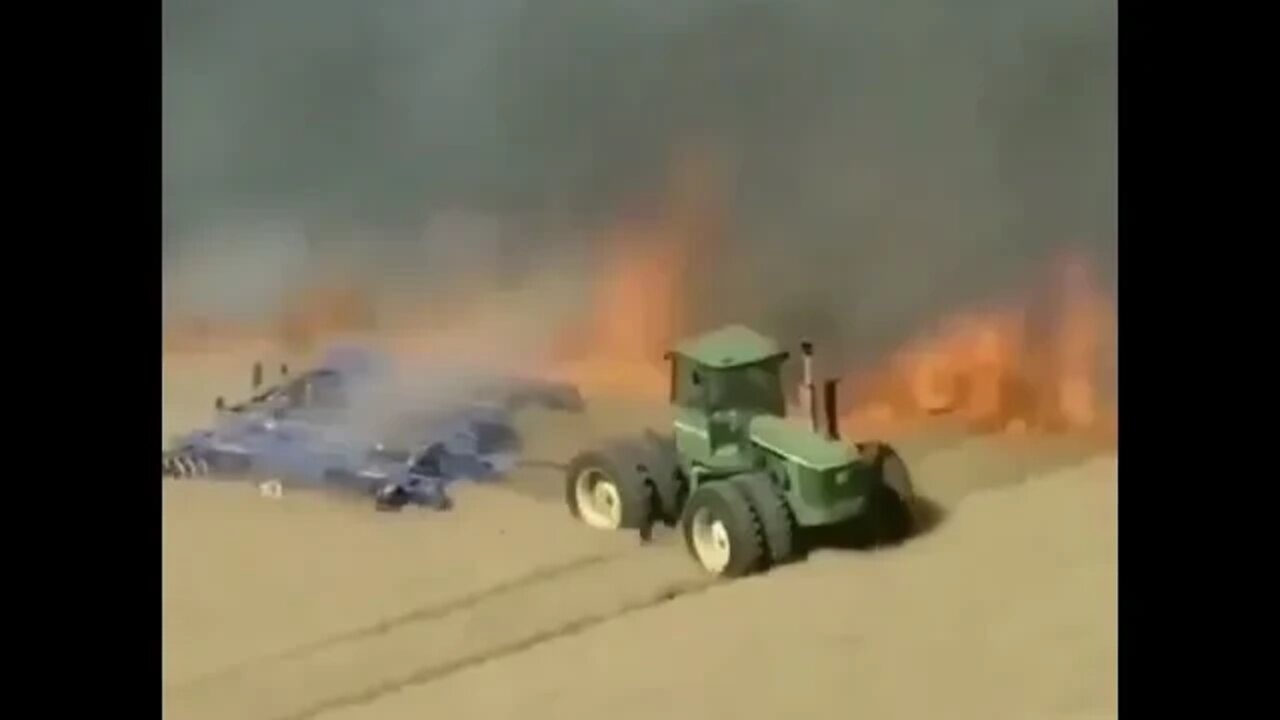 Insane racing a tractor vs fire