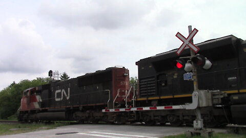 CN 5724, CN 8892 & CN 3857 Engines Manifest Train Westbound At Mandaumin Crossing