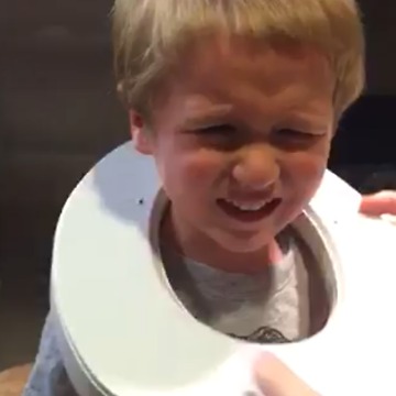 How Did This Boy Get A Toilet Seat Stuck Around His Neck?!