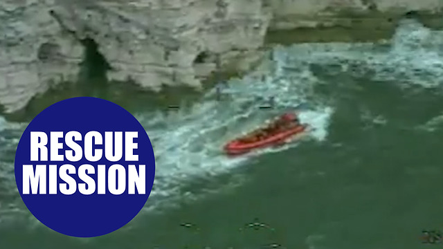 Heroic coastguards rescued a reveller who injured himself while 'tombstoning'