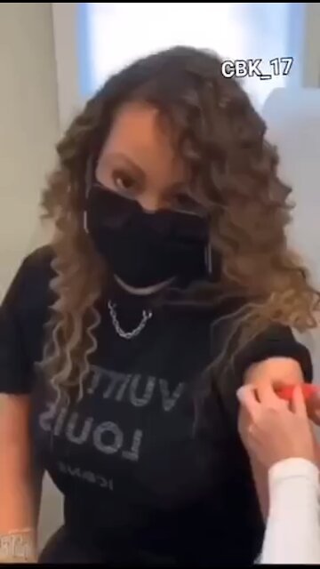 Mariah Carey gets a fake vaccination!