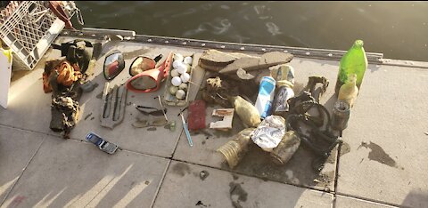 Found some golf balls, 3 mirrors, 1flip phone, bottles, cans, toothbrush, 2 sunglasses, ropes.