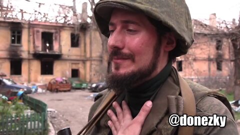 Volunteer from France Francois Modem, who has been living in the DPR for 7 years, sang a song