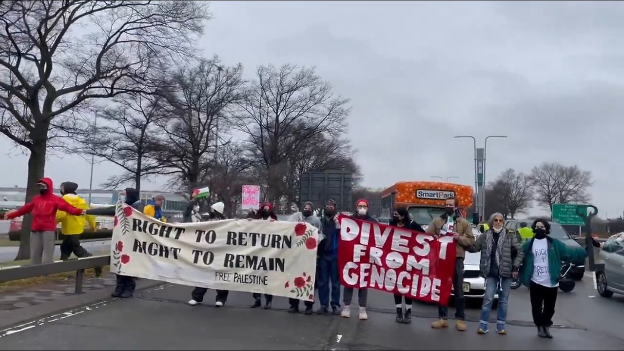 Travelers Walk to JFK Airport As Pro-Hamas Protesters Block Traffic