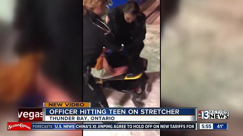 Officer hits teen on stretcher in Ontario