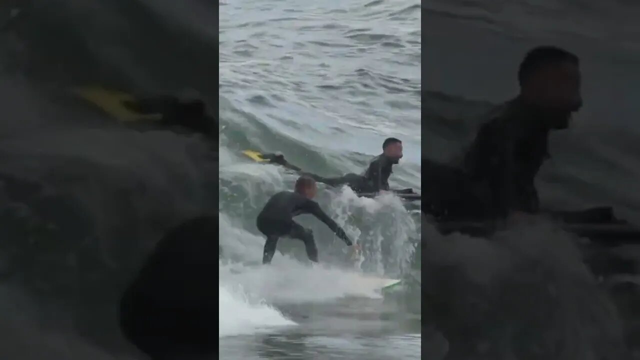 Surfer gets cut off at the wedge