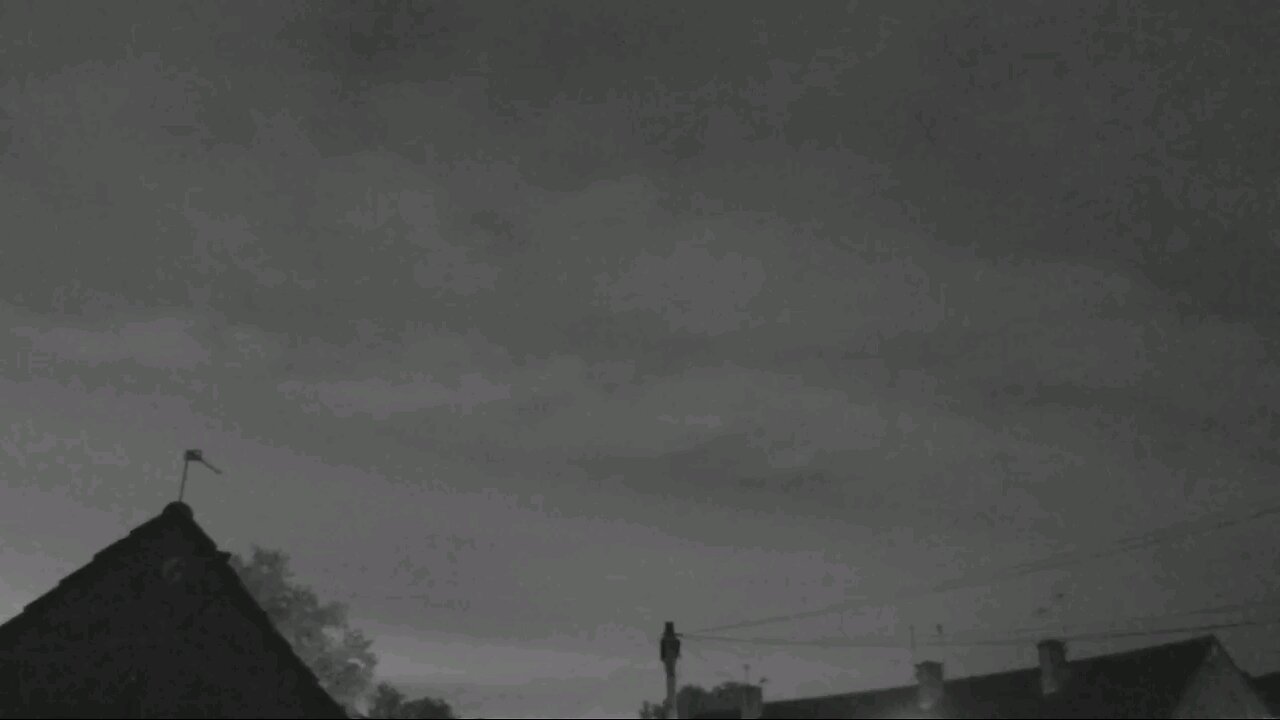 seven flying orb UFOs fly over ring camera over home at night. 🛸