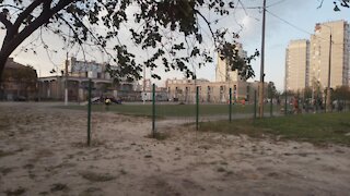 October day at Troeschina, Kiev, children play soccer