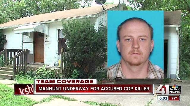 Manhunt underway; Clinton officer killed on duty