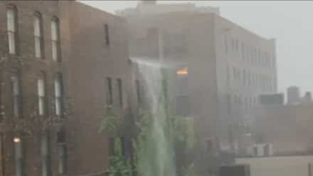 Storm creates huge waterfall on building