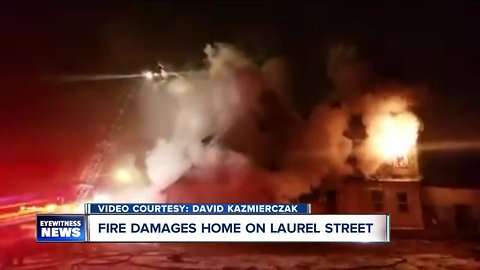 Unoccupied Laurel Street home goes up in flames