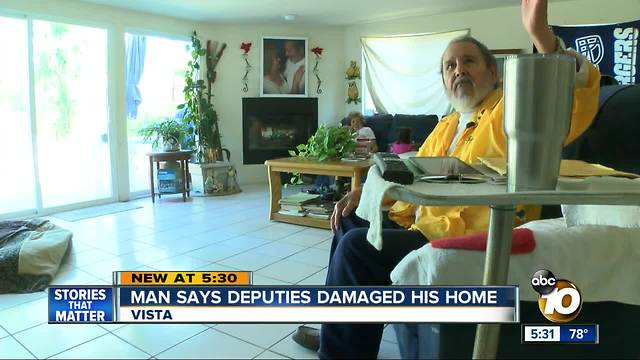 Vista man says deputies damaged his home