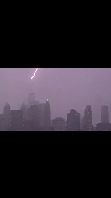 Lightning strikes the top of the One World Trade Center