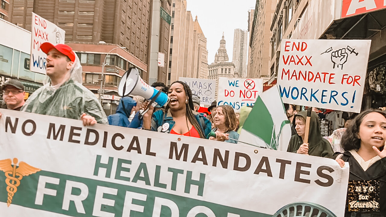 New York City Demonstrators March through Manhattan to Protest Continuing Vaccine and Mask Mandates