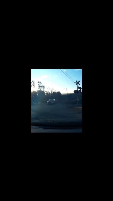 Impatient Idiot Drives Through Railroad Crossing #shorts