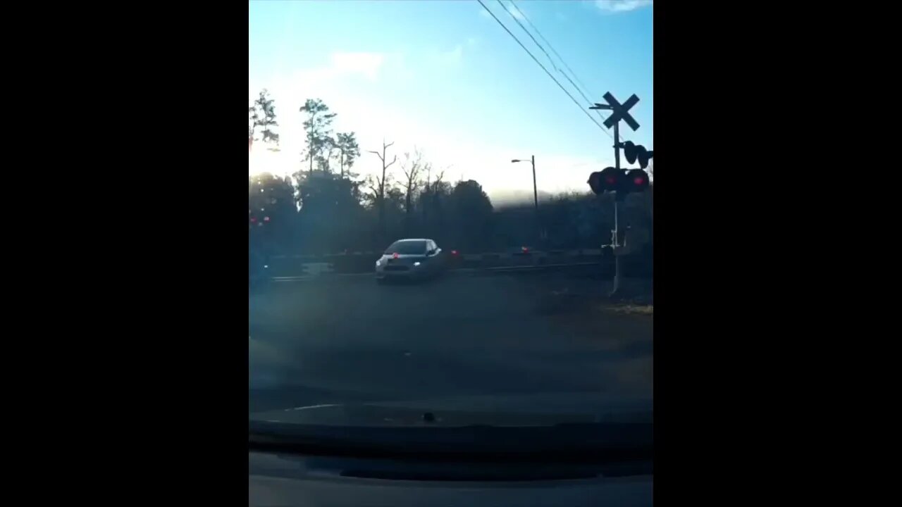 Impatient Idiot Drives Through Railroad Crossing #shorts