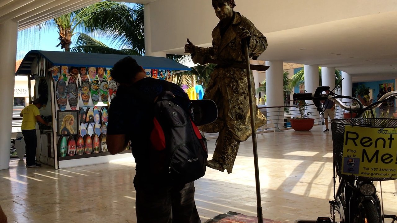 Spectators can't understand how street magician is floating