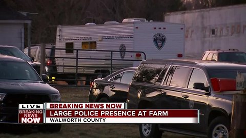 Massive police presence in an East Troy Farm