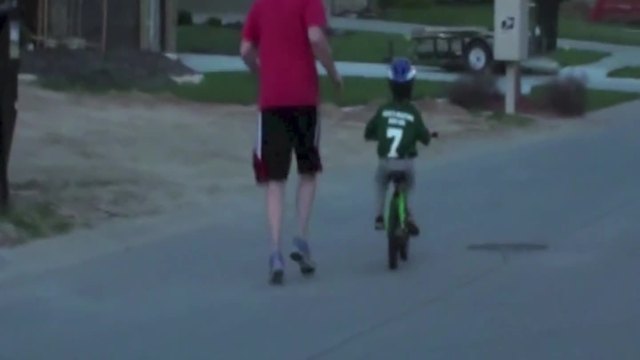 Screaming Kid Learns How To Ride A Bike