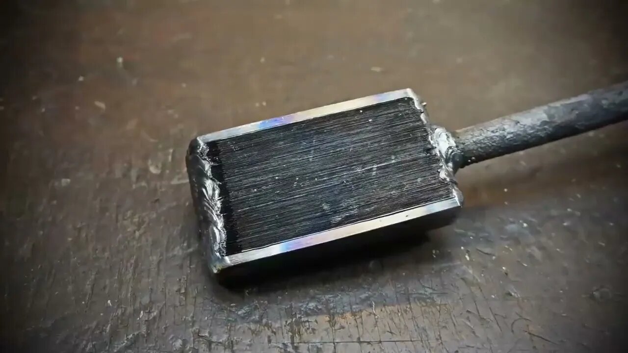 Damascus steel from two tape measures and 100 blades of stationery knives-6