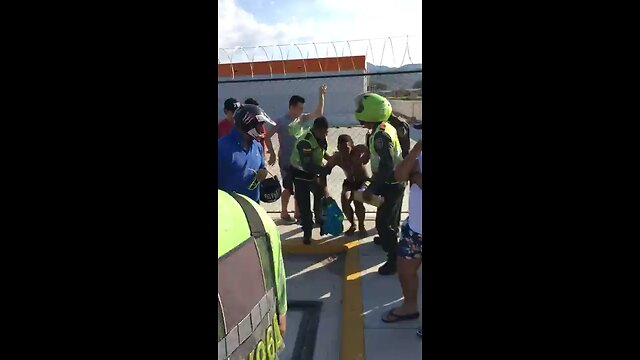 Guy takes a rock to the head