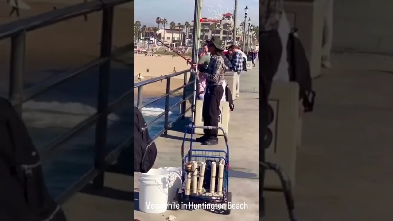 Idiot fishing off a pier hooks a surfer #shorts #crazyvideo #fishing #surfer