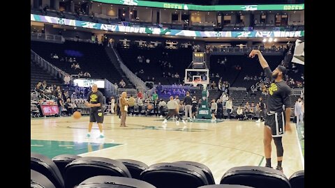 LeBron James remains out against Bucks but is getting his pregame work in with Phil Handy