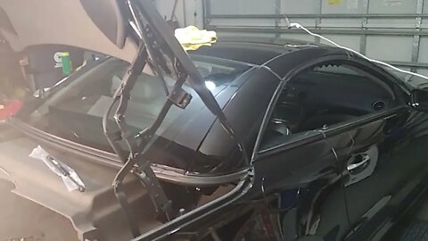 Replacing trunk lid struts on a Mercedes R230 SL500.-2