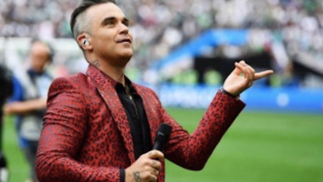 Kijkers reageerden geschokt na het obscene gebaar van Robbie Williams